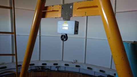 Installing the instrument in the two-meter telescope housing.