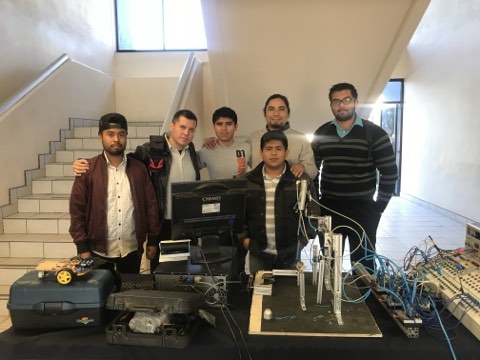 Students presenting their robotics and electronics projects.
